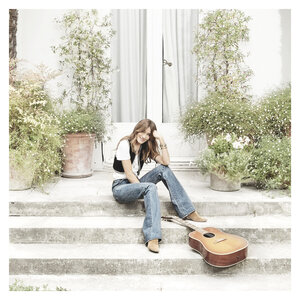 Логотип песни Un grand amour исполнителя Carla Bruni